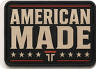American Made patch, block lettering over red rules with a row of stars