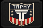 American Shield patch, navy crest with TRPHY wordmark, stars and red and bone bars